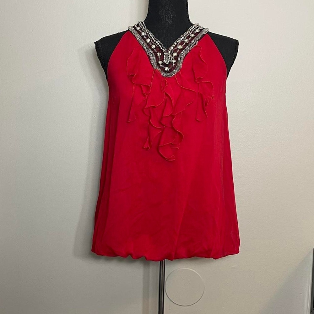 Red halter top with ruffles and beaded neckline